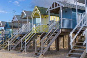 The colourful beach huts in Holkham