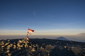 Maha Meru casts its shadow on the clouds below